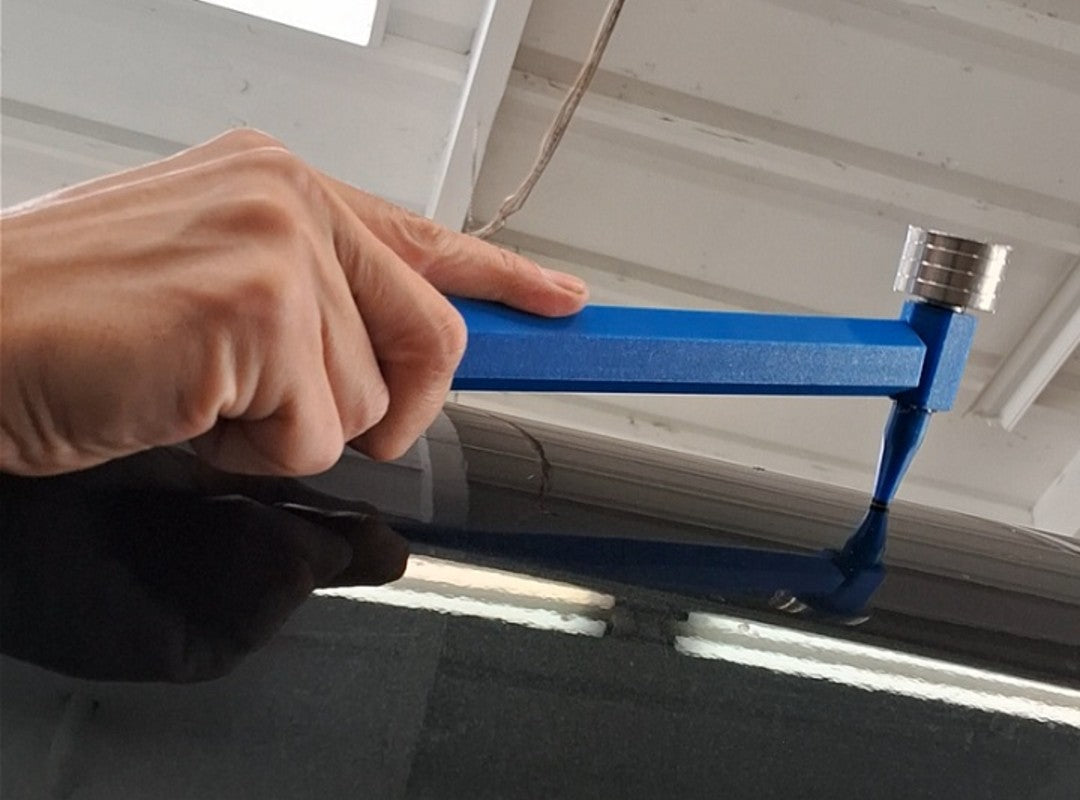 Using a PDR Blending Hammer to remove a dent in a vehicle