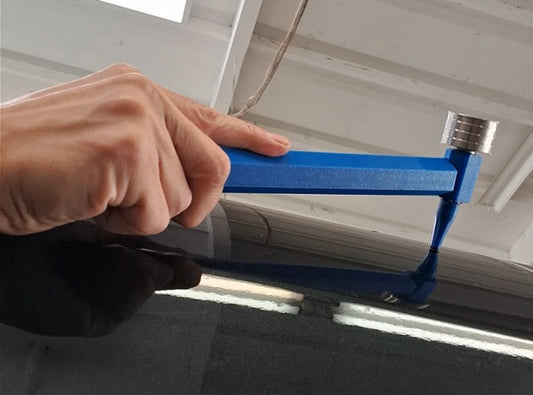 Using a PDR Blending Hammer to remove a dent in a vehicle