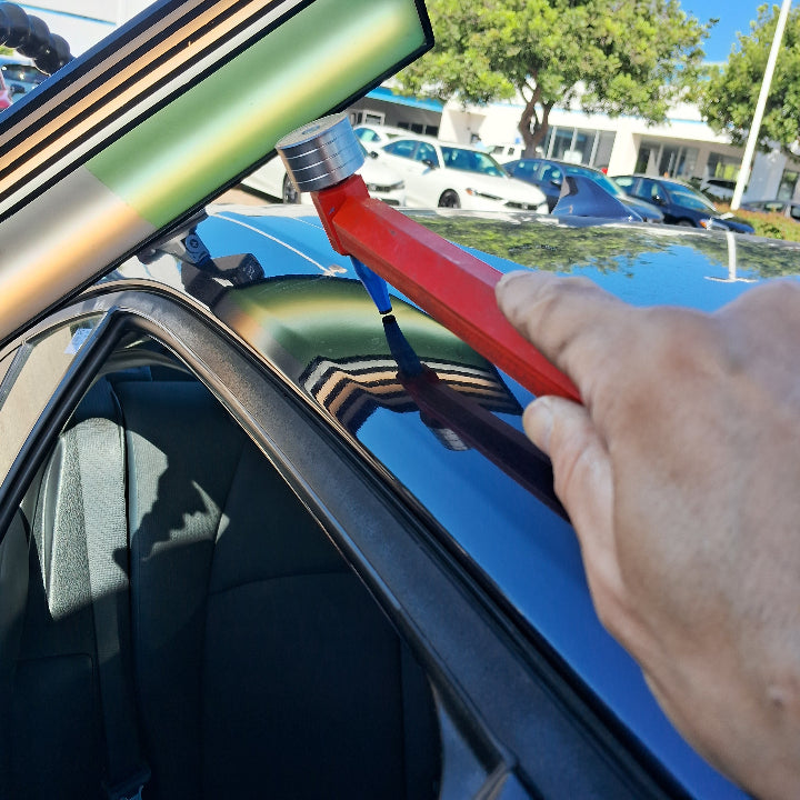 Blending a dent located on the rail on a car