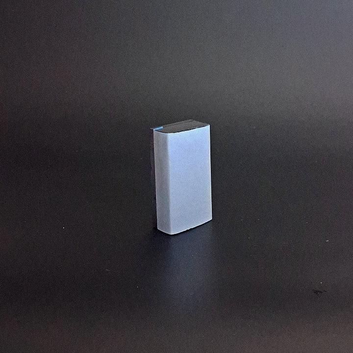 A block for holding sandpaper used in automotive detailing